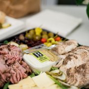 a platter of meat and cheese