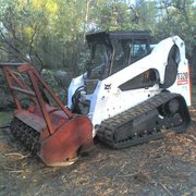 Bobcat with mastication head