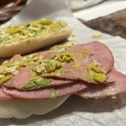 two sub sandwiches with toppings