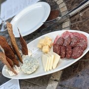 a platter of meat and cheese