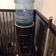 This Alhambra water cooler delivers refreshing chilled water to the patrons.