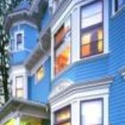 the front of a blue house