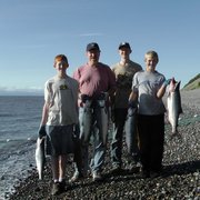 a group of people on the beach