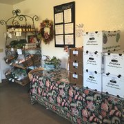 a table with boxes of produce
