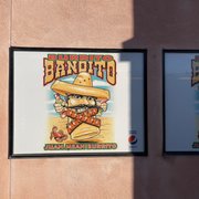 two posters on a wall