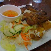 Grilled Pork Chop Served with Steam Rice and Salad