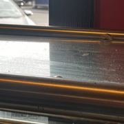the reflection of a car in the window