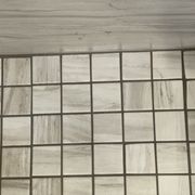 After light grout cleaning in primary bathroom shower