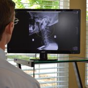 Reviewing patient xray prior to adjustment.