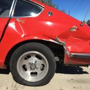 quarter panel crumpled after the accident