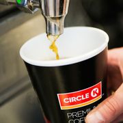 coffee being poured into a cup
