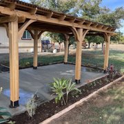 New cement and pergola followed by a planter
