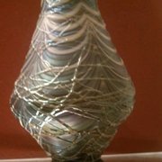 Threaded vase.