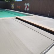 Updated the pool by removing old Concrete,  pouring new Concrete with a nice broom finish