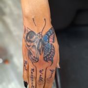 Butterfly on hand