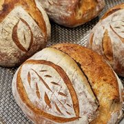 fresh baked breads on a cooling rack