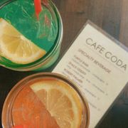 Drink menu: pink drink is Strawberry Fields, blue drink is the Hawaii one!