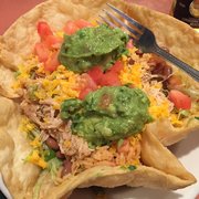 Chicken taco salad with added rice, beans, and no sour cream.