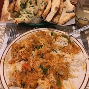 The Chicken Karahi, a delicious spicy curry with bell peppers, onions and rice. #happybelly