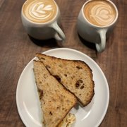 Vanilla latte, oat milk mocha, and the breakfast sandwich.