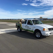 Nice looking truck doing weed control at Corning Municipal Airport.