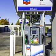 a gas pump at a chevron gas station