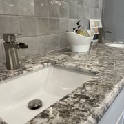 Karran Kassel stainless steel faucet. 6" tall. comes in black and polished.