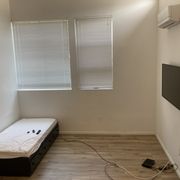 You can see "stains" on the walls. Those were left by the previous tenant who lived in this unit for over year before I ever moved in.