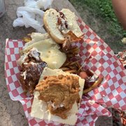 New piece of chicken unmelted cheese one piece of bacon.