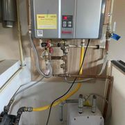 Recirculation pump installation on this tankless water heater for instant hot water at all fixtures.