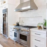 a kitchen with stainless steel appliances