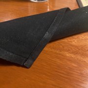 a napkin and a glass of water