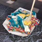 Waffle cone cup, vanilla ice cream and gummy sharks for the win!