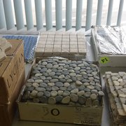 Natural stone pebble and marble mosaics