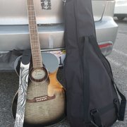 BRAND NEW FENDER with custom feel. DOPE strap, and guitar case.
