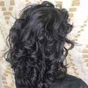 Curly cut and style by Dana