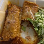 2 Enchiladas with heavy oily sauce and shredded beef instead of chicken