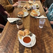 Yummy soup, sandwiches and side salads