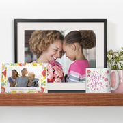 a picture of a mother and daughter on a shelf