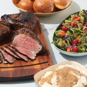 steak, mashed potatoes, and a salad