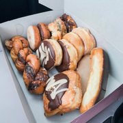 Dozen donuts: chocolate Square, tiger tail, old fashioned, maple & chocolate bars