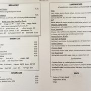 Breakfast sandwiches, bakery case, beverages, sandwiches, sides.