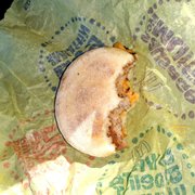 Went through the drive thru on my way to work and ordered a sausage mcmuffin no egg and recieved a half eaten sausage mcmuffin.