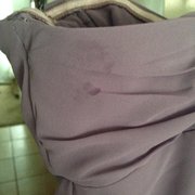Stain on badly altered dress that wasn't even STARTED on the day/time I was picking up. This is one of THREE stains.