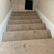 Destroyed carpet on stairs