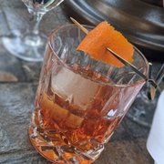 a glass filled with a drink