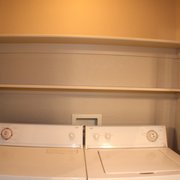 Full size washer and dryer that have their own closet!