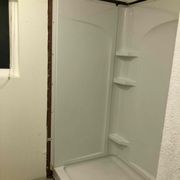 Replaced the standard tub shower with a shower pan and new shower surround.