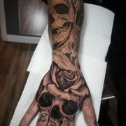 Skull sleeve tattoo