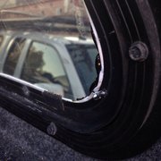Screws sticking out and glass pieces left in the truck bed.